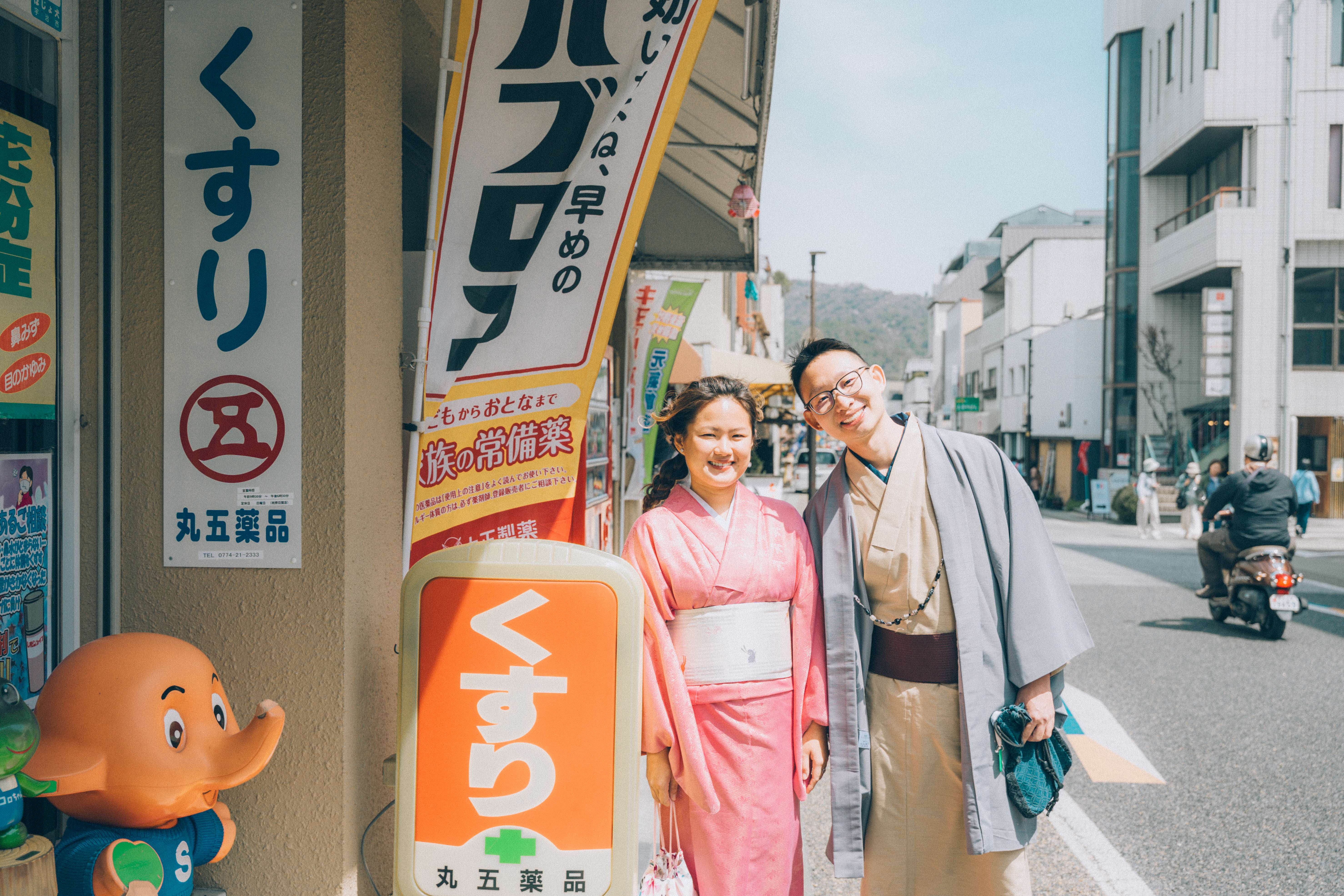 Couple in traditional kimono on authentic Japanese street
